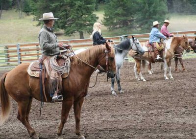 Backing horses in a row at McGinnis Meadows Cattle and Guest Ranch